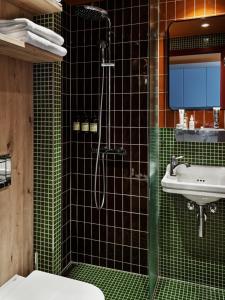 Koupelna v ubytování Dahei Apartment Hotel + 27 fotografií