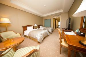 High1 Grand Hotel Main Tower的电视和/或娱乐中心