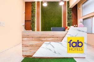 Posezení v ubytování FabExpress Sunset Residency - Nr Apollo Hospitals