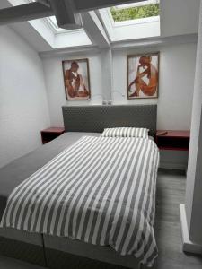 Postel nebo postele na pokoji v ubytování Brauhaus Suite 16