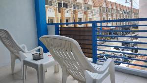 Balkón nebo terasa v ubytování Phuket Racha Kata Homestay