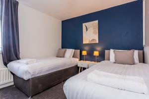 Giường trong phòng chung tại Bruce Place