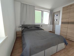 Villa Krysia 50 m do morza客房内的一张或多张床位