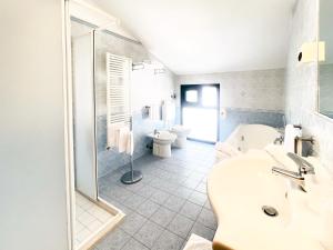 Koupelna v ubytování Hotel Bolognese