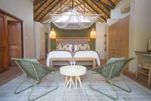 Posezení v ubytování Ntamba Safari Lodge