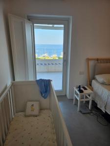Postel nebo postele na pokoji v ubytování Villa in Panarea with an amazing view