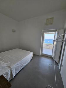 Postel nebo postele na pokoji v ubytování Villa in Panarea with an amazing view
