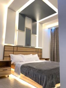 Postel nebo postele na pokoji v ubytování Serenity Houses