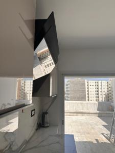 TV a/nebo společenská místnost v ubytování RoofTop Aouina Deluxe sans assesseur