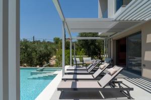 Πισίνα στο ή κοντά στο Anthemis Luxury Villas 1