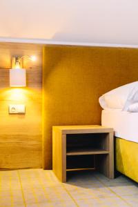 Postel nebo postele na pokoji v ubytování Hotel SKI