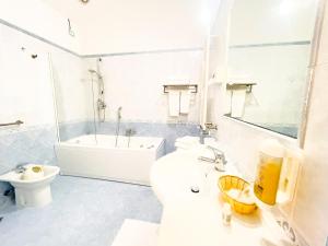 Koupelna v ubytování Hotel Bolognese