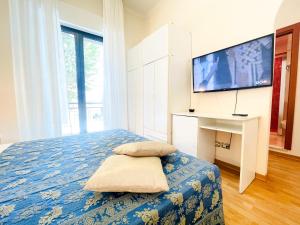 TV a/nebo společenská místnost v ubytování Hotel Bolognese