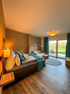 Postel nebo postele na pokoji v ubytování Veenland Hotel
