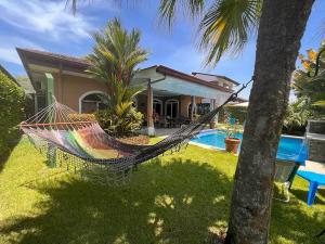 エステリリョスにあるVilla Almera By Vacation Pura Vidaの家庭のハンモック