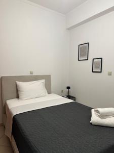 Postel nebo postele na pokoji v ubytování Eros Apartment Superb View