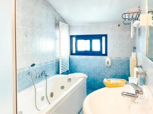 Koupelna v ubytování Hotel Bolognese + 27 fotografií