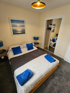 Postel nebo postele na pokoji v ubytování Modern Dornoch Apartment
