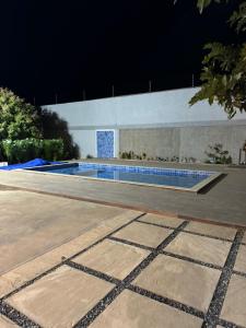 Chácara e Pousada Paraíso游泳池或附近泳池