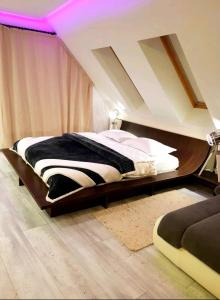 Ένα ή περισσότερα κρεβάτια σε δωμάτιο στο Синьо лято