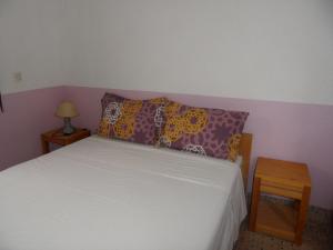 Uma cama ou camas num quarto em Gite Tigmi Azrur