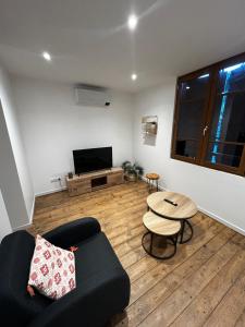 Χώρος καθιστικού στο Petite maison de village