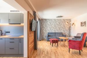 Kuchyň nebo kuchyňský kout v ubytování Hotel Alpensonne