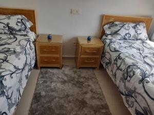 Postel nebo postele na pokoji v ubytování Schöne Wohnung in Saidia