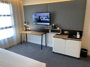 Kuchyň nebo kuchyňský kout v ubytování Holiday Inn Dijon Sud - Longvic by IHG
