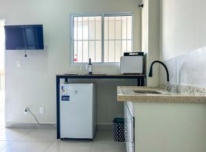 A cozinha ou kitchenette de Loft com WiFi otimo para Home Office - Sorocaba SP