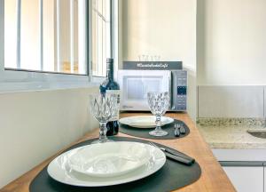 A cozinha ou kitchenette de Loft com WiFi otimo para Home Office - Sorocaba SP
