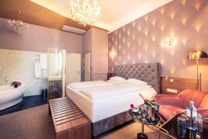 Posteľ alebo postele v izbe v ubytovaní BoutiqueHOTEL Donauwalzer