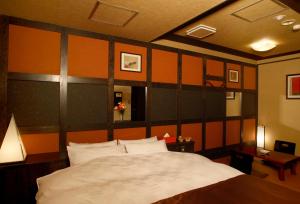 Postelja oz. postelje v sobi nastanitve HOTEL K's ABA Adult Only