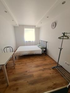 Postel nebo postele na pokoji v ubytování Donaco