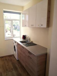 Kuchyň nebo kuchyňský kout v ubytování Donaco