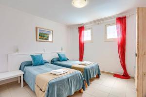 Postel nebo postele na pokoji v ubytování Villa Pou Dor by Villa Plus