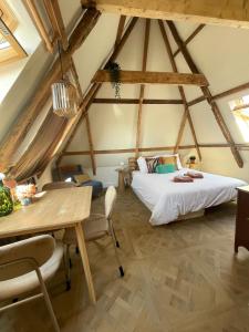 Postel nebo postele na pokoji v ubytování B&B Suupmarkt