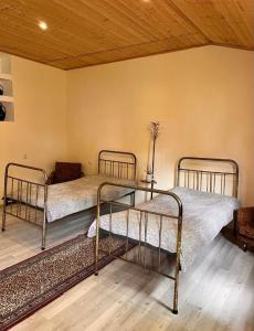 Letto o letti in una camera di Cozy Qorte