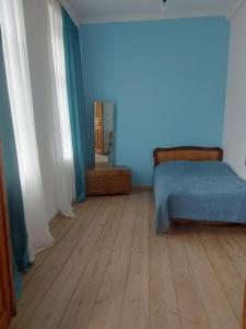 Letto o letti in una camera di Cozy Qorte