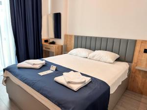 Ένα ή περισσότερα κρεβάτια σε δωμάτιο στο Silence Garden Suite GRP +27 φωτογραφίες