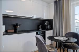 Η κουζίνα ή μικρή κουζίνα στο NOVERA Apartments - Donizetti C +30 φωτογραφίες