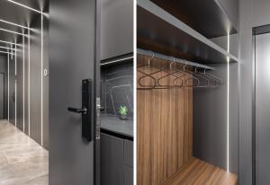 a kitchen with a wooden door and a counter at Center Apartments BAG, With PRIVATE FREE PARKING in Pula