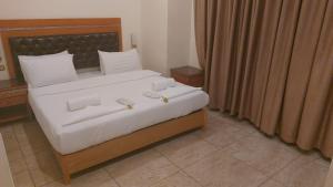 Kama o mga kama sa kuwarto sa Jawheret Alswefia Hotel Suite