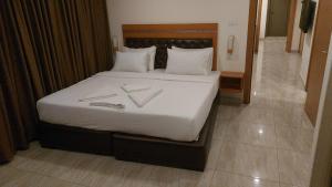 Kama o mga kama sa kuwarto sa Jawheret Alswefia Hotel Suite