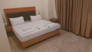 Kama o mga kama sa kuwarto sa Jawheret Alswefia Hotel Suite