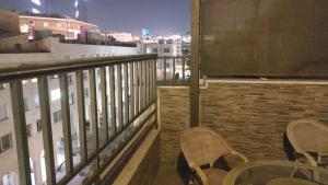 Balcony o terrace sa Jawheret Alswefia Hotel Suite