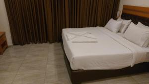 Kama o mga kama sa kuwarto sa Jawheret Alswefia Hotel Suite