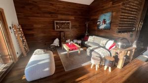 Posezení v ubytování Penthouse l'Ourse Bleue - Sauna privatif - accès direct aux pistes + 37 fotografií