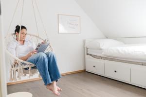 A bed or beds in a room at Landgut Riegerbauer