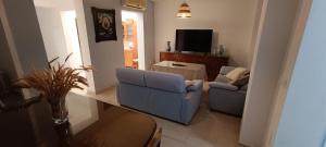 TV a/nebo společenská místnost v ubytování La Casa de Mari